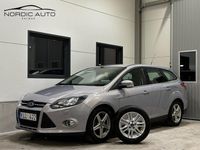 Begagnad Ford Focus Titanium 125 HK (91 kW) 2012 Grå Kombi