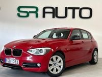 Begagnad BMW 118 Sport Line 143 HK (105 kW) 2011 Röd Halvkombi