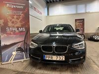 Begagnad BMW 118 Sport Line 143 HK (105 kW) 2014 Svart Halvkombi