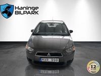 Begagnad Mitsubishi Colt 96 HK (70 kW) 2012 Brun Halvkombi