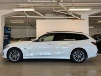 Begagnad BMW 330e Sport Line 293 HK (215 kW) 2021 Vit Kombi