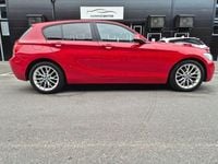 Begagnad BMW 118 Sport Line 143 HK (105 kW) 2012 Röd Halvkombi
