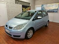 Begagnad Mitsubishi Colt 95 HK (69 kW) 2004 Blå Halvkombi