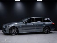Begagnad Mercedes C300e AMG Line Premium 313 HK (230 kW) 2022 Grå (grå metallic ) Kombi