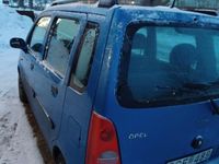 Begagnad Opel Agila 75 HK (55 kW) 2001 Ljusblå med vissa bucklor Minibuss