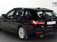 Begagnad BMW 330e Shadowline 2022 Svart Kombi