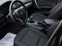 Begagnad BMW 118 Advantage 143 HK (105 kW) 2008 Svart Halvkombi
