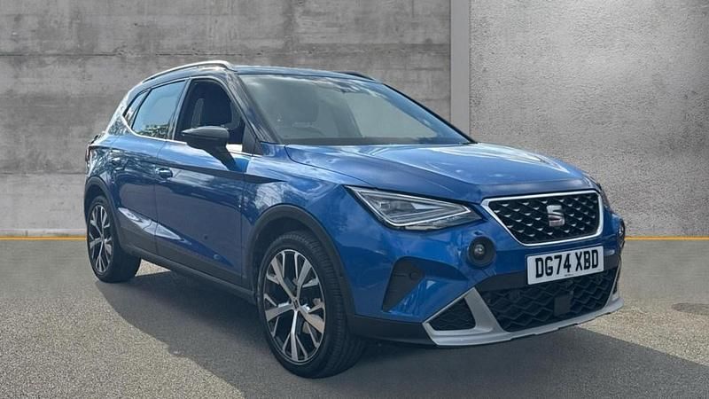 Metallic saphire blue with black roof Used 2024 Seat Arona Xperience Lux SUV | £19,990 (A bit pricey) - Image 1/4