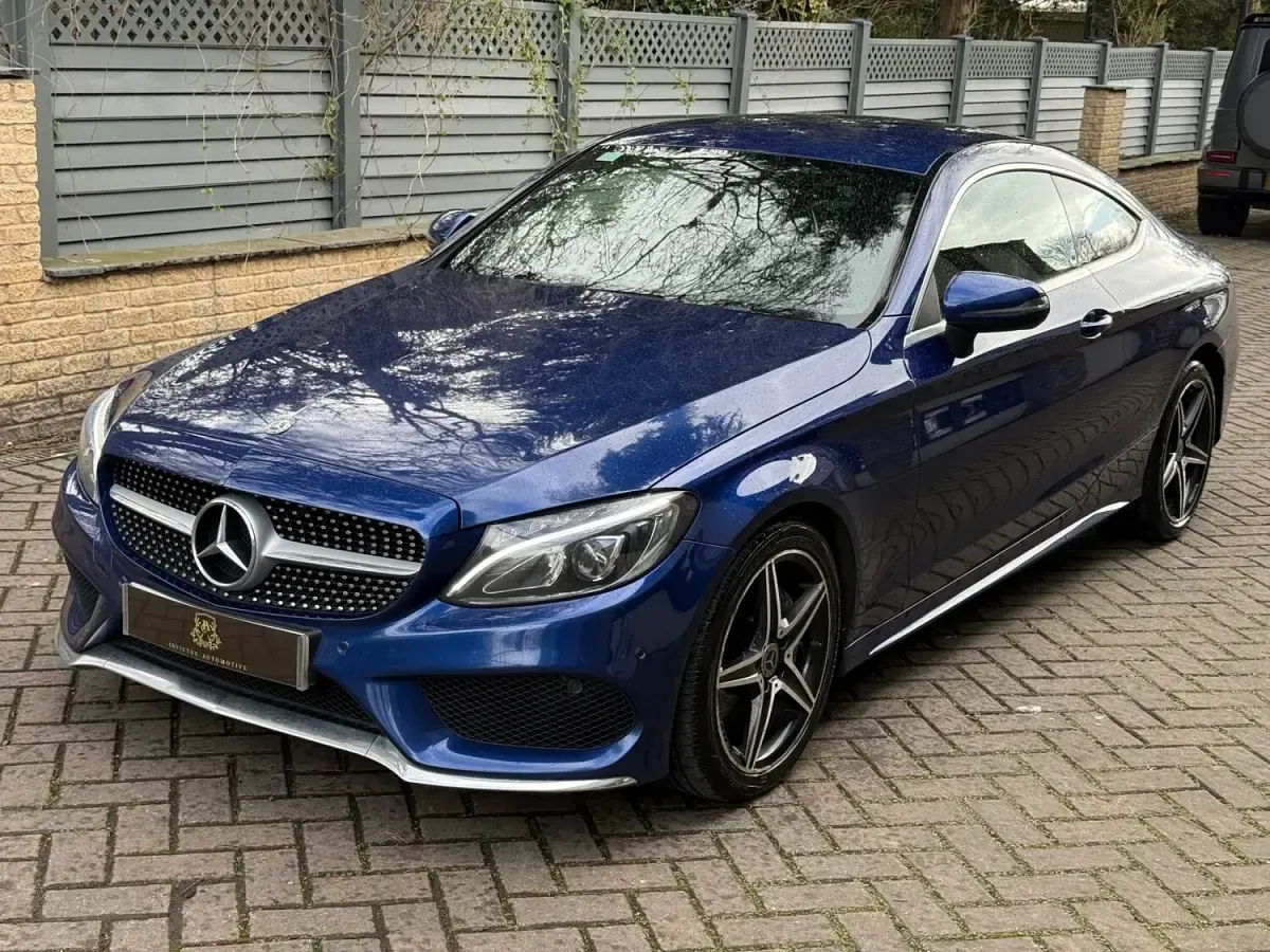 Used Mercedes C220 AMG line 170 HP (125 kW) 2018 Blue Coupe