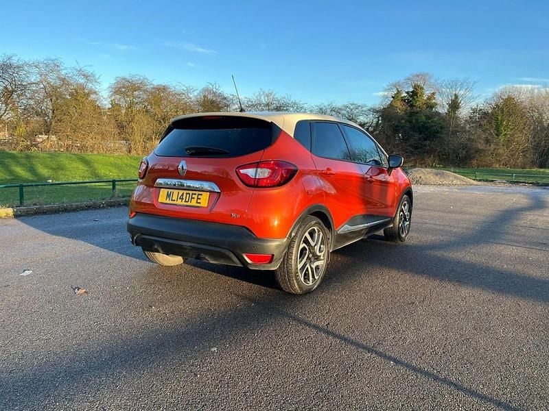 Used Renault Captur Dynamique 90 HP (66 kW) 2014 Orange/cream SUV