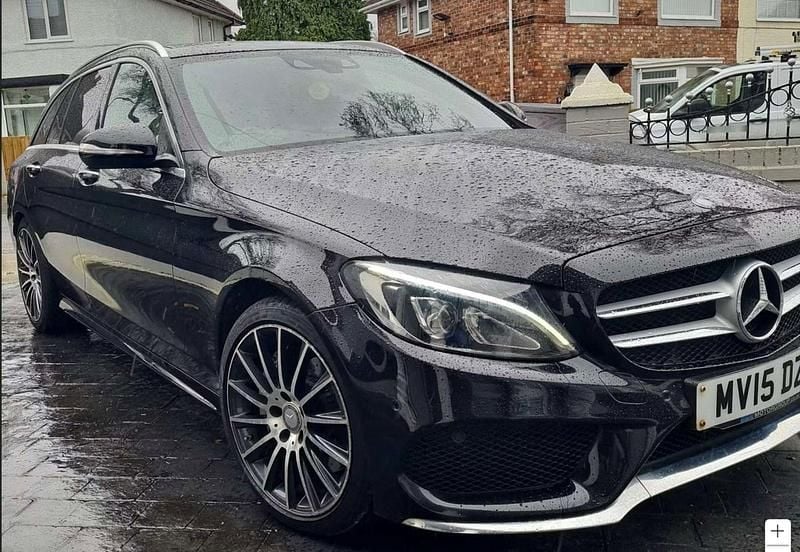 Used Mercedes C300e AMG Line Premium Plus 231 HP (169 kW) 2015 Black Estate