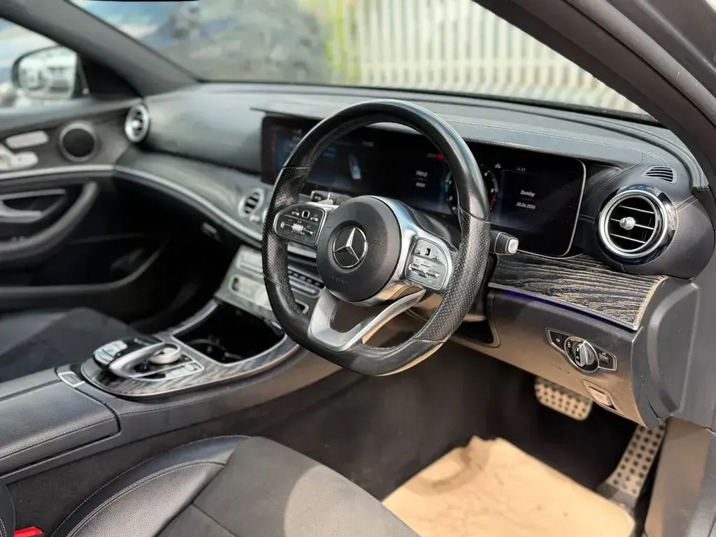 Used Mercedes E220 AMG line 194 HP (142 kW) 2019 Grey Sedan