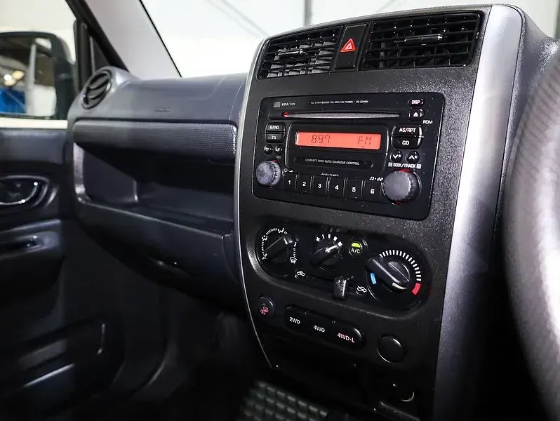 Used Suzuki Jimny SZ4 85 HP (62 kW) 2012 Black SUV