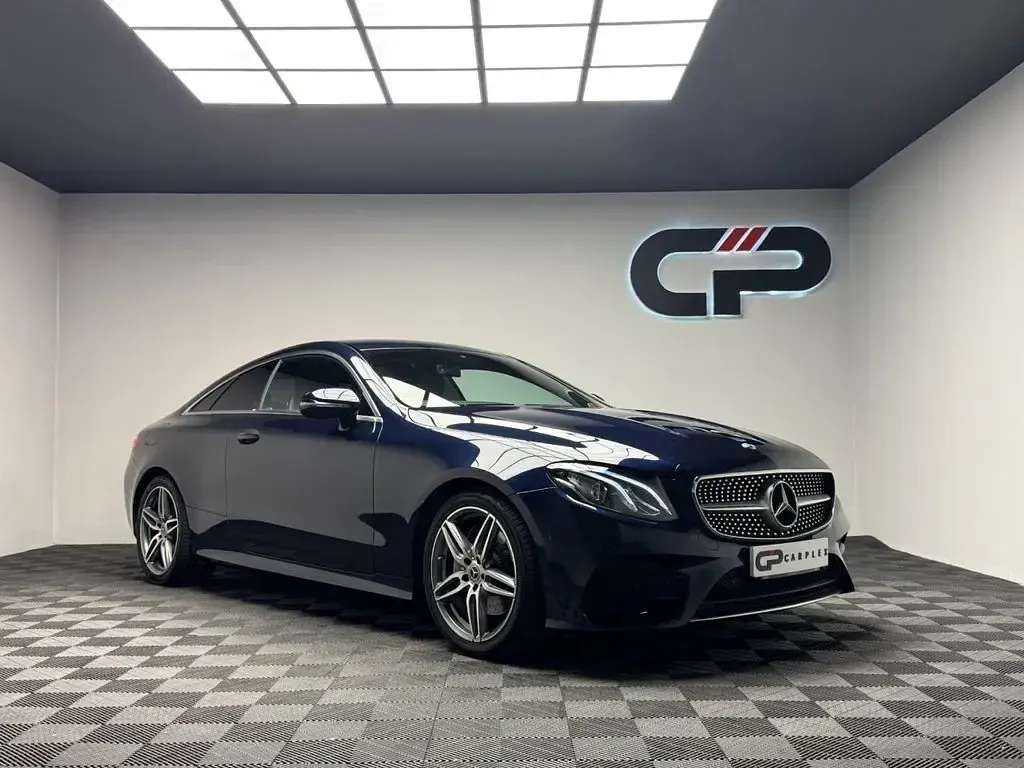 Used Mercedes E220 AMG line 194 HP (142 kW) 2018 Blue Coupe