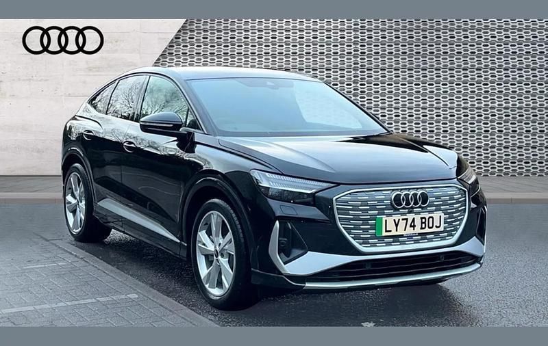 Black Used 2024 Audi Q4 Sportback e-tron S-Line SUV | £35,765 (Super price) - Image 1/4