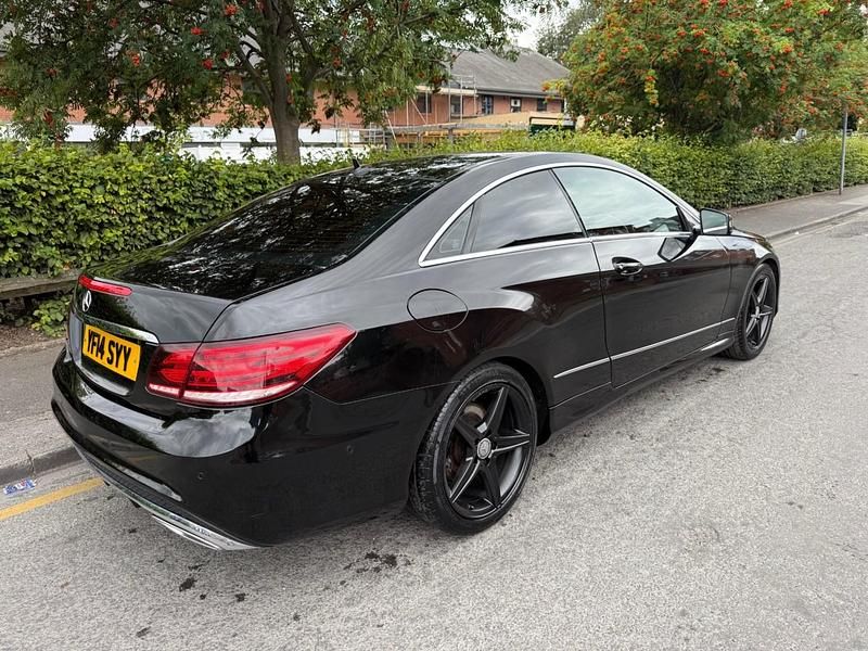 Used Mercedes E220 AMG 170 HP (125 kW) 2014 Black Coupe