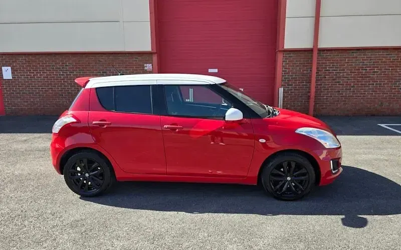 Usado Suzuki Swift SZ-L 94 HP (69 kW) 2016 Vermelho Citadino