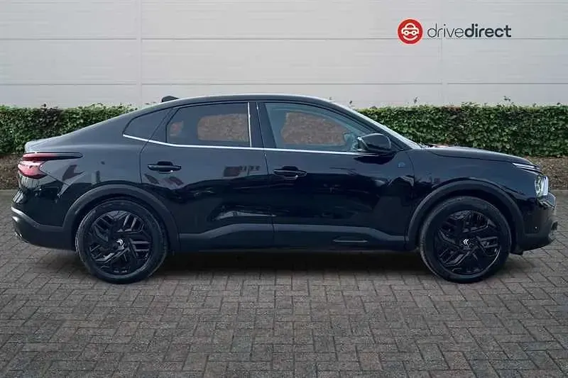 Używany Citroën e-C4 100 kW (136 KM) 2024 Czarny Sedan/Limuzyna