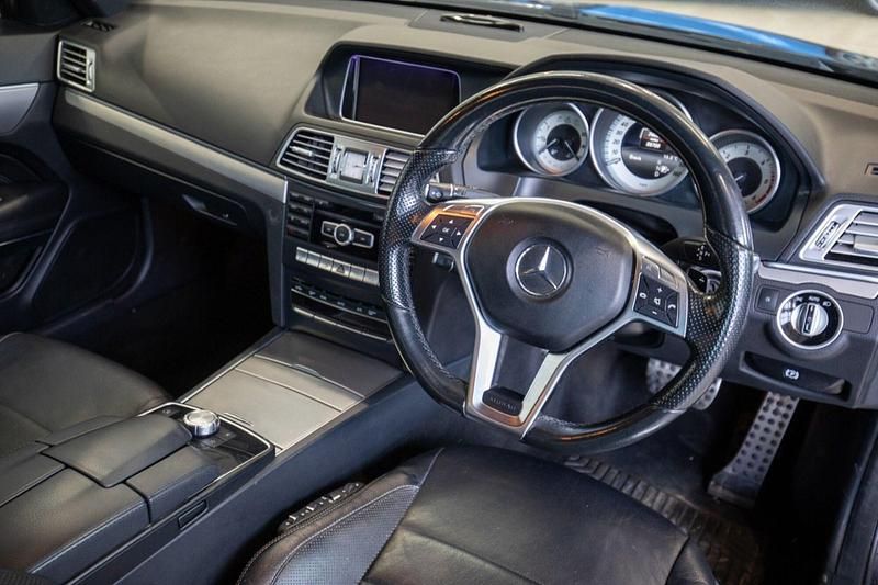 Used Mercedes E250 AMG line 204 HP (150 kW) 2014 Blue Coupe