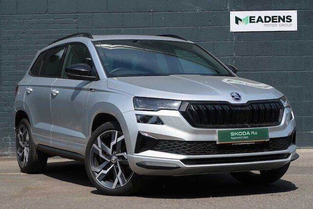 Brilliant silver metallic Used 2024 Skoda Karoq SportLine SUV | £27,295 (Super price) - Image 1/4