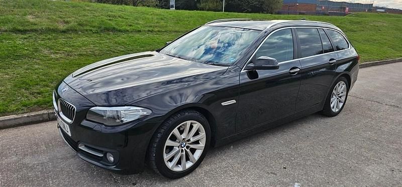 Używany BMW 520 Comfort Edition 181 KM (133 kW) 2014 Czarny Kombi