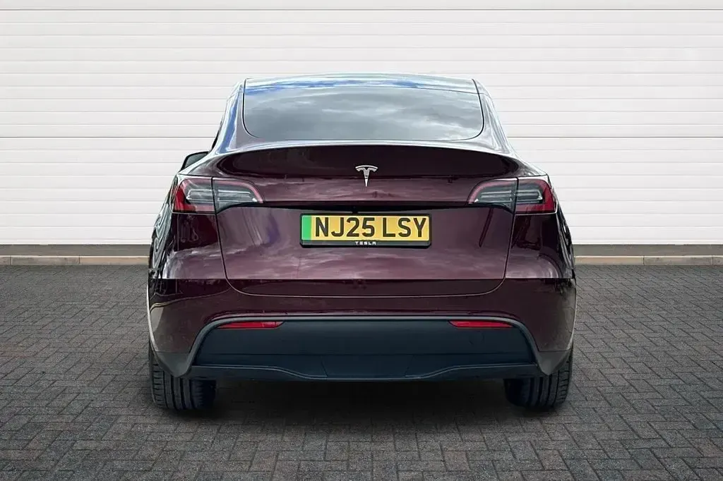 Used Tesla Model Y Long Range RWD 85 kW (116 HP) 2025 Red SUV