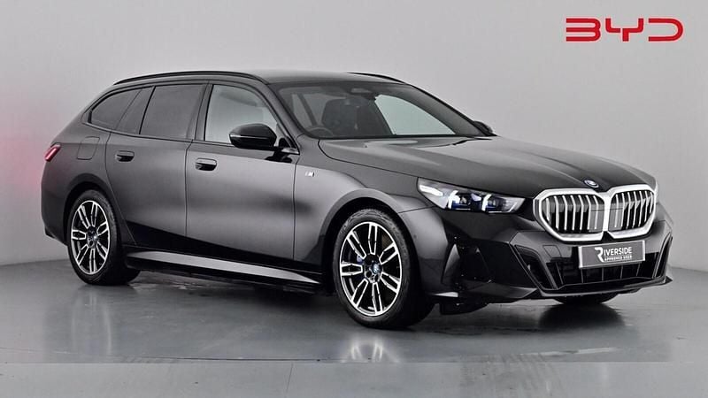 Obsidian black Used 2024 BMW i5 M Sport Estate | £43,590 (Fair price) - Image 1/4