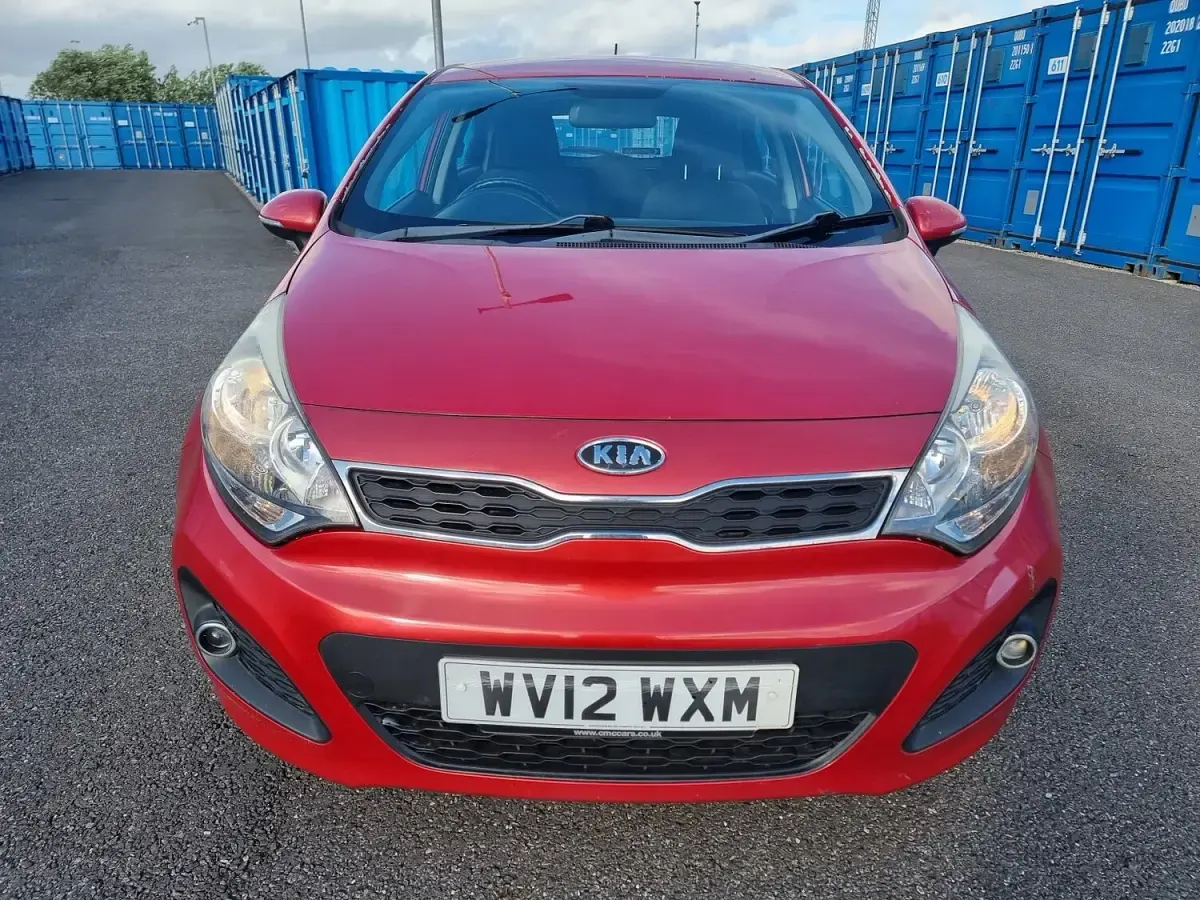 Used Kia Rio 84 HP (61 kW) 2012 Red Hatchback