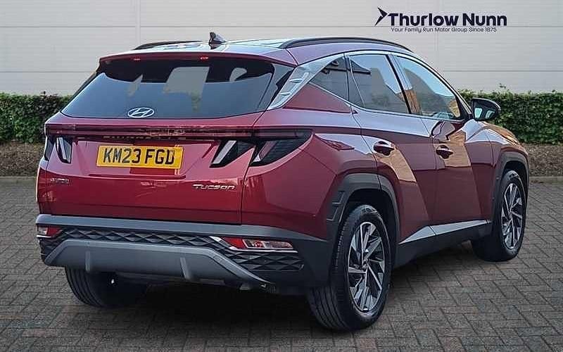 Used Hyundai Tucson Premium 150 HP (110 kW) 2023 Sunrise red SUV