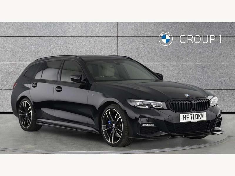 Black sapphire metallic paint Used 2021 BMW 330 M Sport Estate | £33,495 (Expensive) - Image 1/4