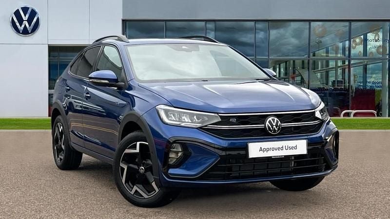 Reef blue metallic New 2025 VW Taigo R-line SUV | £27,348 (Good price) - Image 1/4