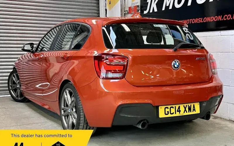 Used BMW M135 M Performance 320 HP (235 kW) 2014 Orange Hatchback