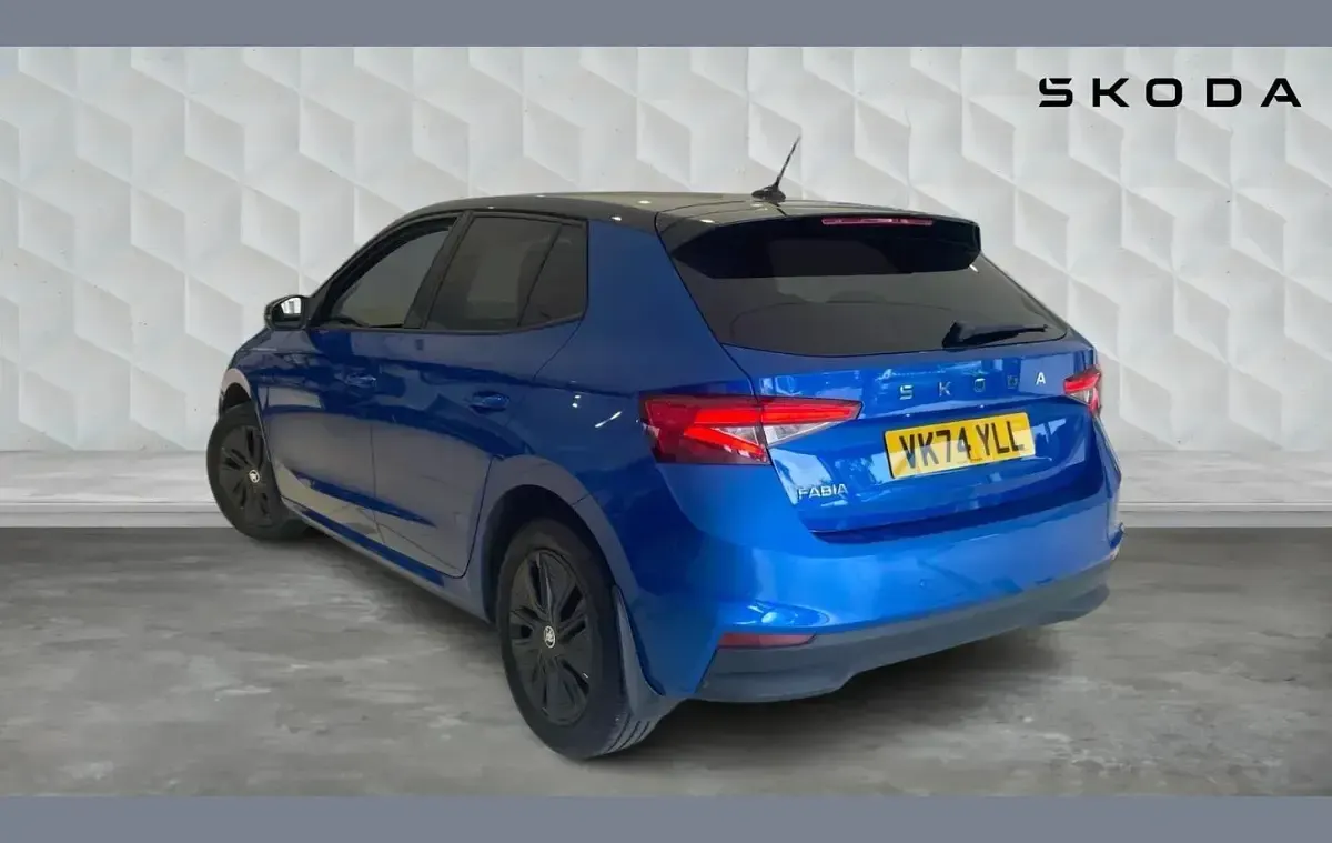 Used Skoda Fabia Design Edition 94 HP (69 kW) 2024 Race blue metallic black magic pearl effect Hatchback