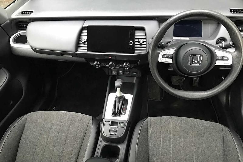 Used Honda Jazz Hybrid 109 HP (80 kW) 2023 Premium crystal red Hatchback