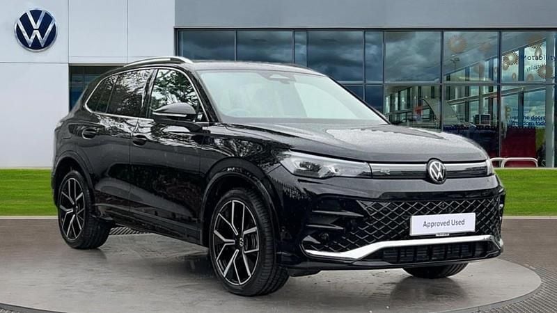 Grenadilla black metallic Used 2025 VW Tiguan R-line SUV | £35,589 (Expensive) - Image 1/4