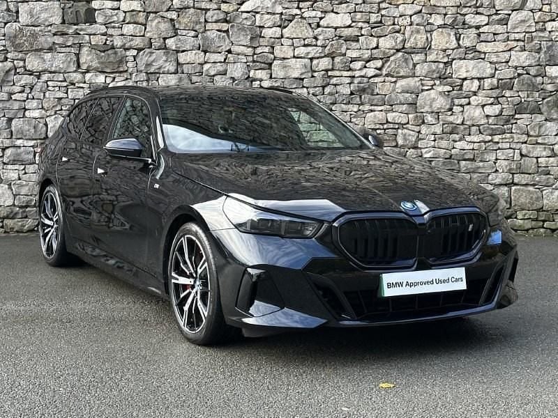 Black Used 2025 BMW i5 M Sport Estate | £52,749 - Image 1/4