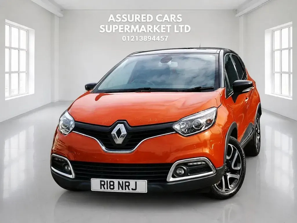 Used Renault Captur Dynamique 90 HP (66 kW) 2014 Orange/black SUV