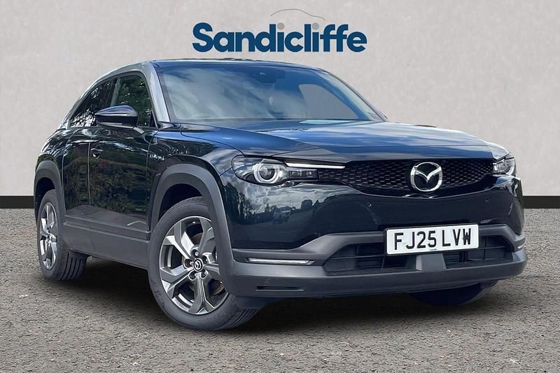 Two tone metallic jet black with silver side panels New 2025 Mazda MX30 Makoto SUV | £17,657 (Fair price) - Image 1/4