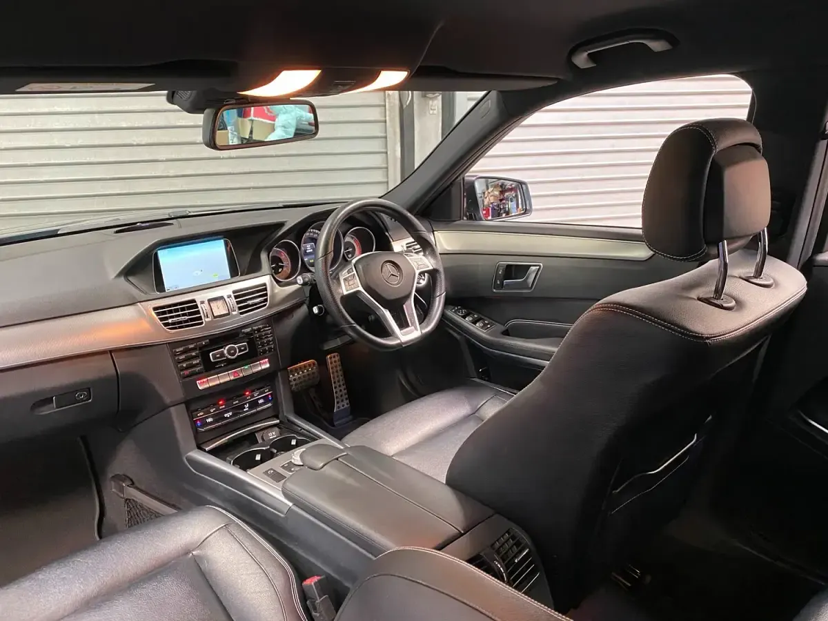 Used Mercedes E250 AMG line 204 HP (150 kW) 2015 Grey Estate