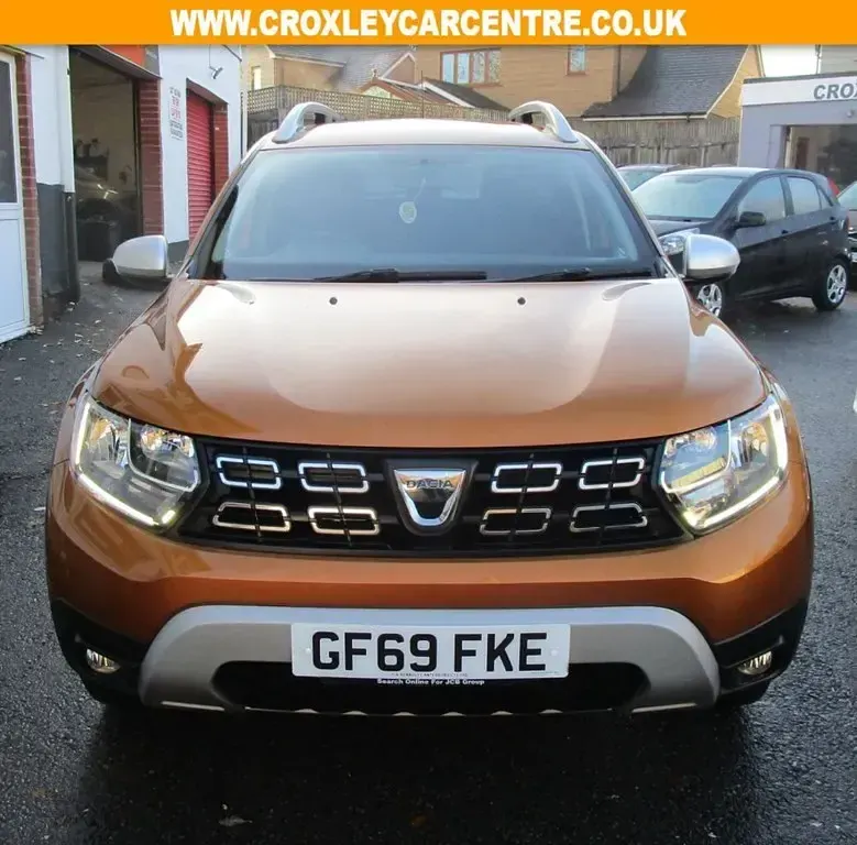 Second-hand Dacia Duster Comfort 130 CP (95 kW) 2019 Portocaliu SUV