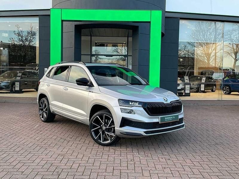 Brilliant silver metallic Used 2023 Skoda Karoq SportLine SUV | £26,290 (Fair price) - Image 1/4
