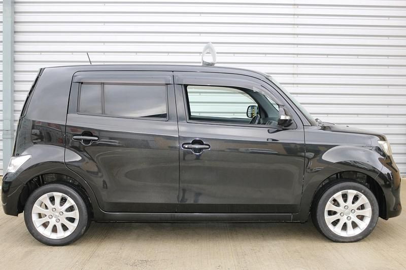 Usado Toyota BB Multidrive S 2011 Negro Utilitario