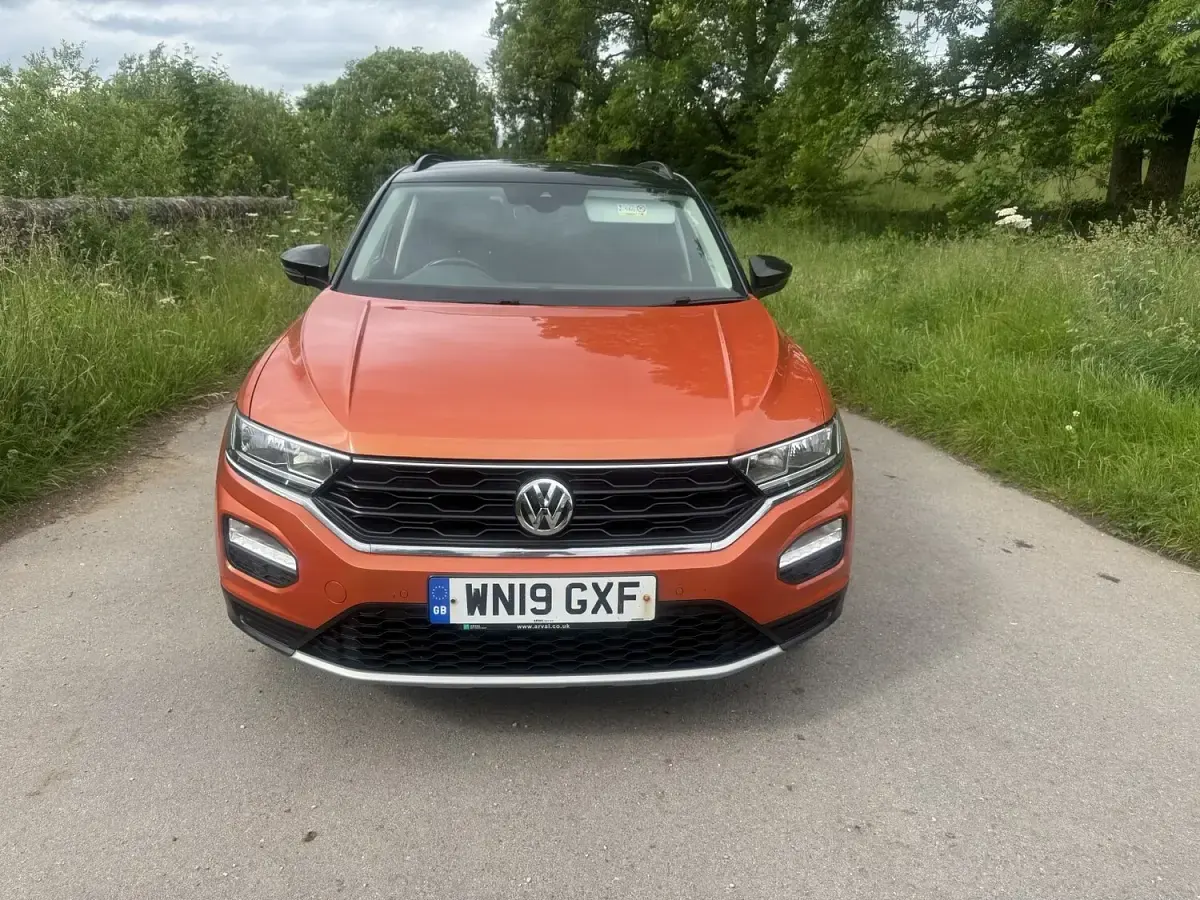 Used VW T-Roc Design 115 HP (84 kW) 2019 Orange SUV