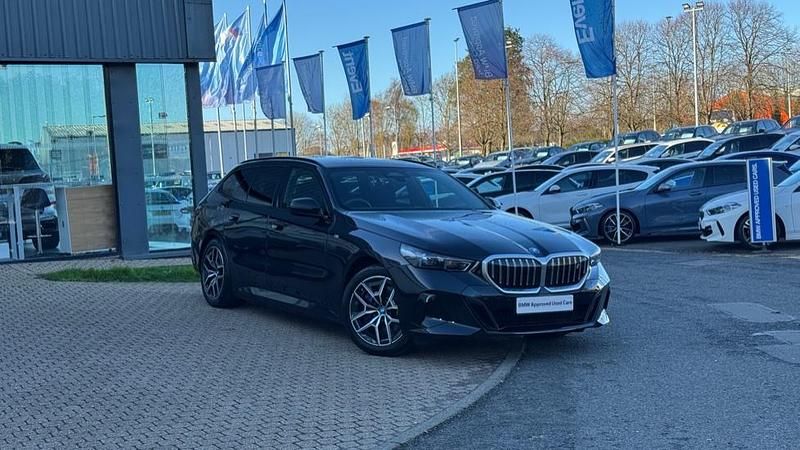 Black Used 2025 BMW i5 M Sport Estate | £55,895 (Expensive) - Image 1/4