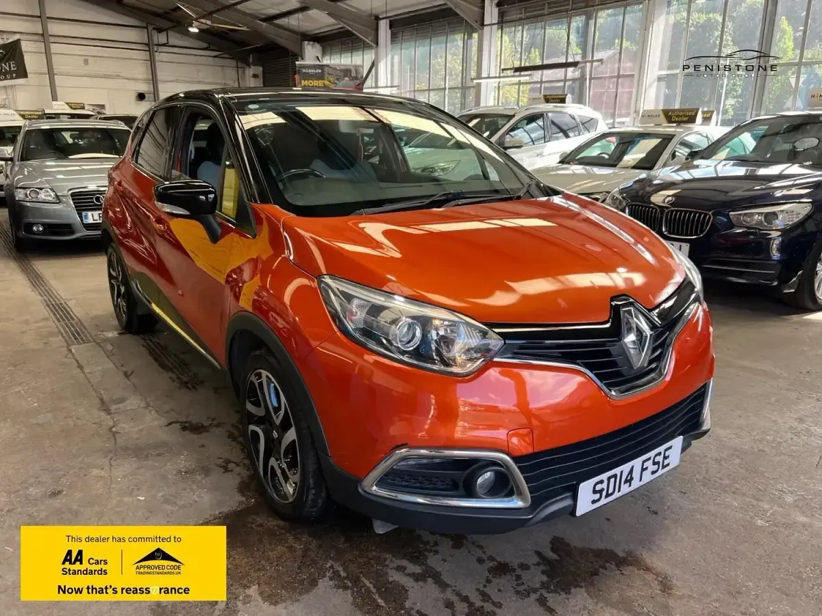 Used Renault Captur Dynamique 90 HP (66 kW) 2014 Orange/black SUV