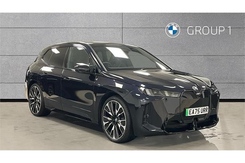 Carbon black New 2025 BMW iX M Sport SUV | £64,990 (Super price) - Image 1/4