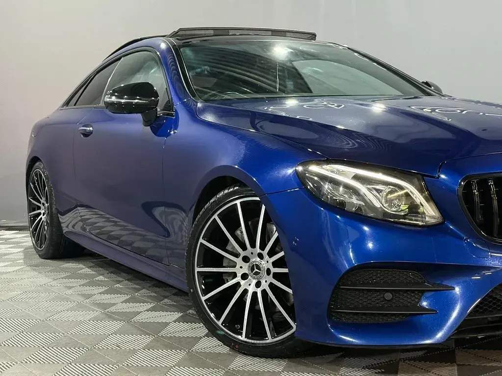 Used Mercedes E220 AMG line 194 HP (142 kW) 2019 Blue Coupe