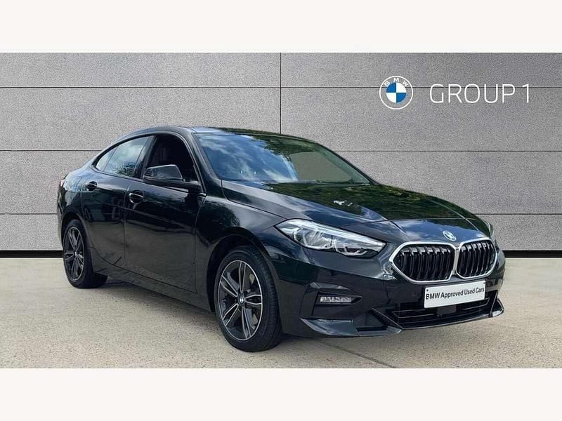 Black sapphire metallic paint Used 2023 BMW 218 Sport Line Coupe | £23,895 (Fair price) - Image 1/4