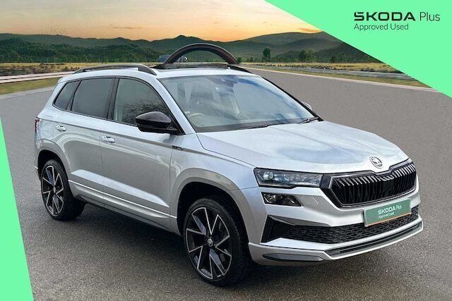 Brilliant silver metallic Used 2023 Skoda Karoq SportLine SUV | £26,495 (Fair price) - Image 1/4
