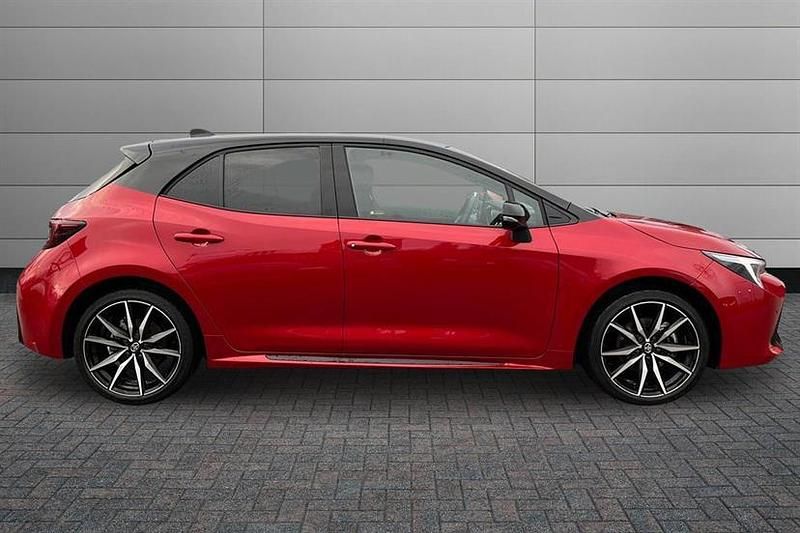 Used Toyota Corolla Sport 178 HP (130 kW) 2025 Scarlet flare with black roof Hatchback